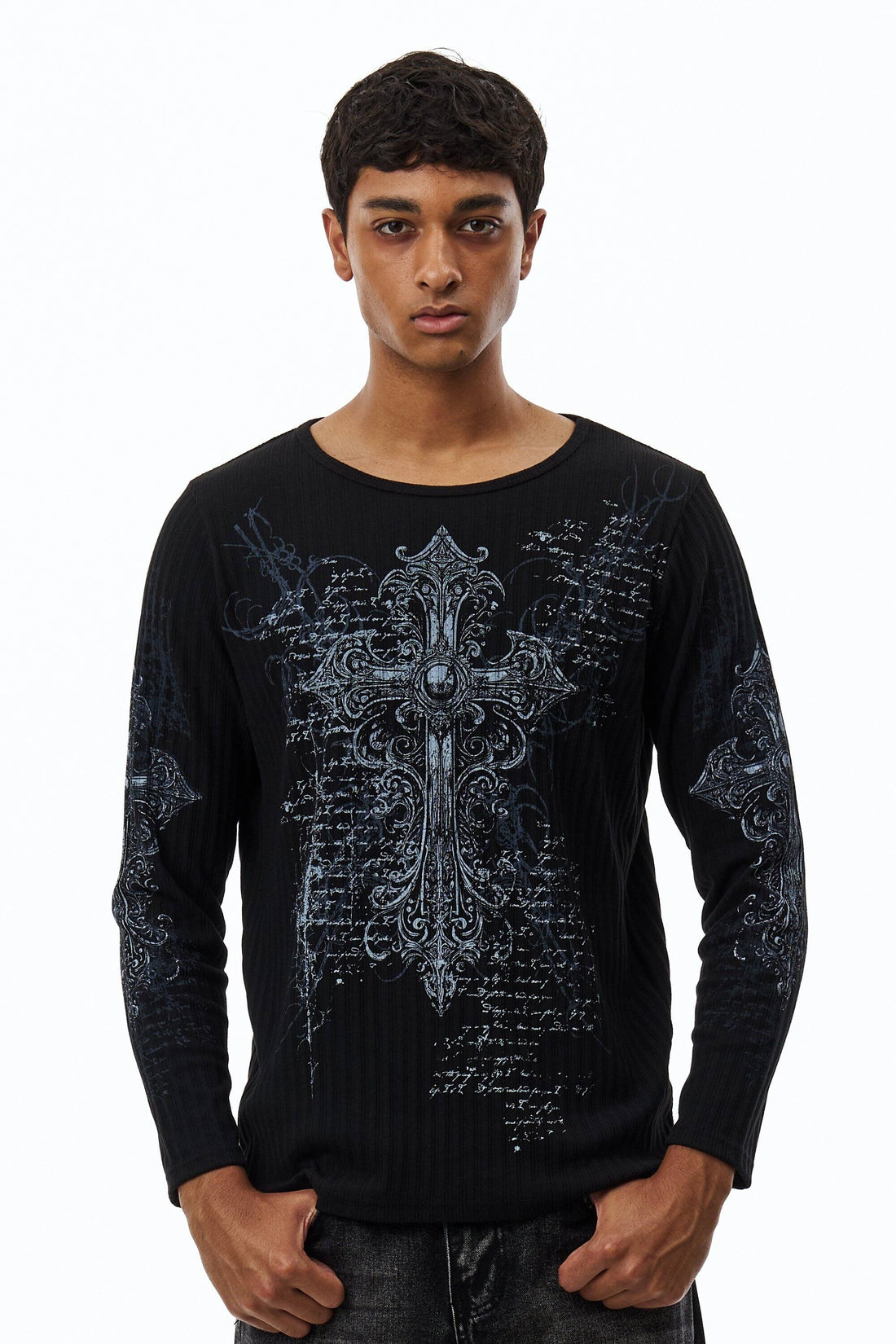 Model wearing the black Scripture Ribbed Long Sleeve with ornate cross and script print