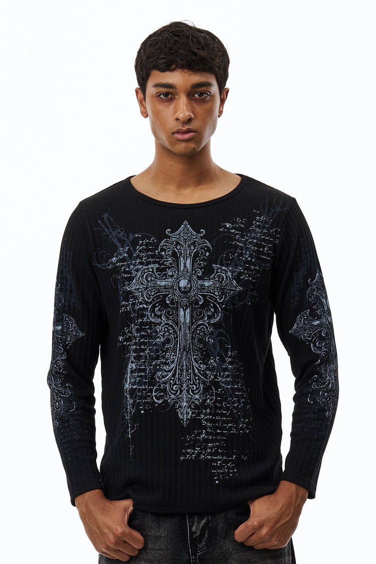 Model wearing the black Scripture Ribbed Long Sleeve with ornate cross and script print