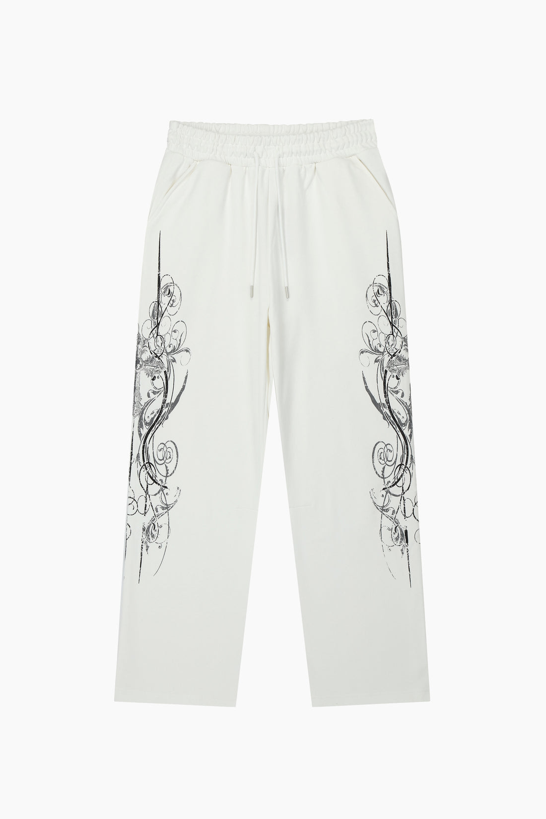 Front of the White Crux Sweatpants laid flat with black filigree crosses down both legs