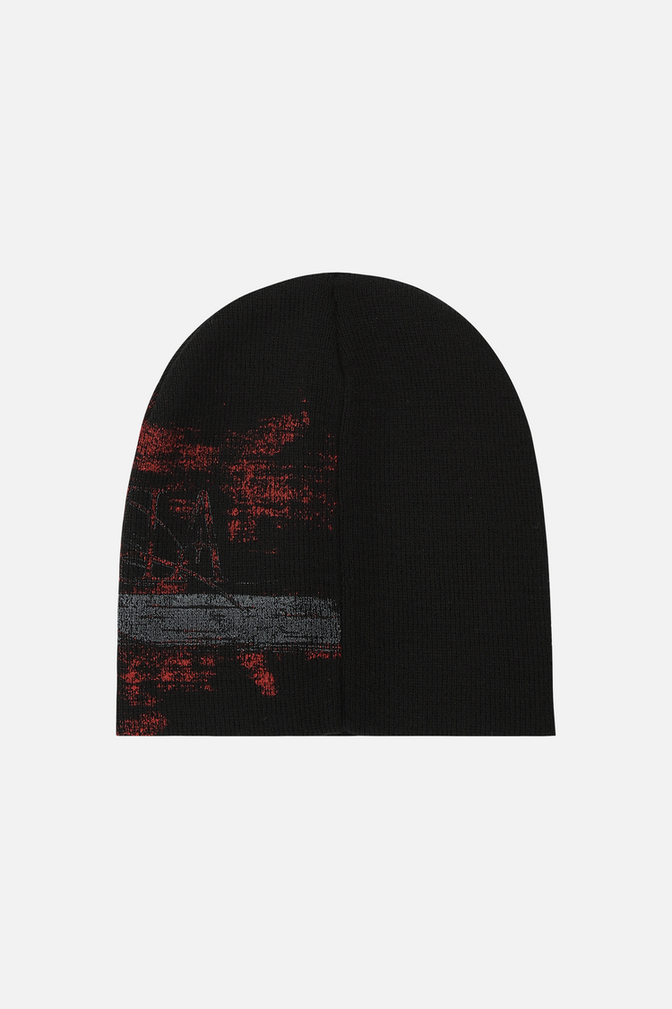 Back of the Chaos Beanie laid flat, mostly black with red and grey knit streaks