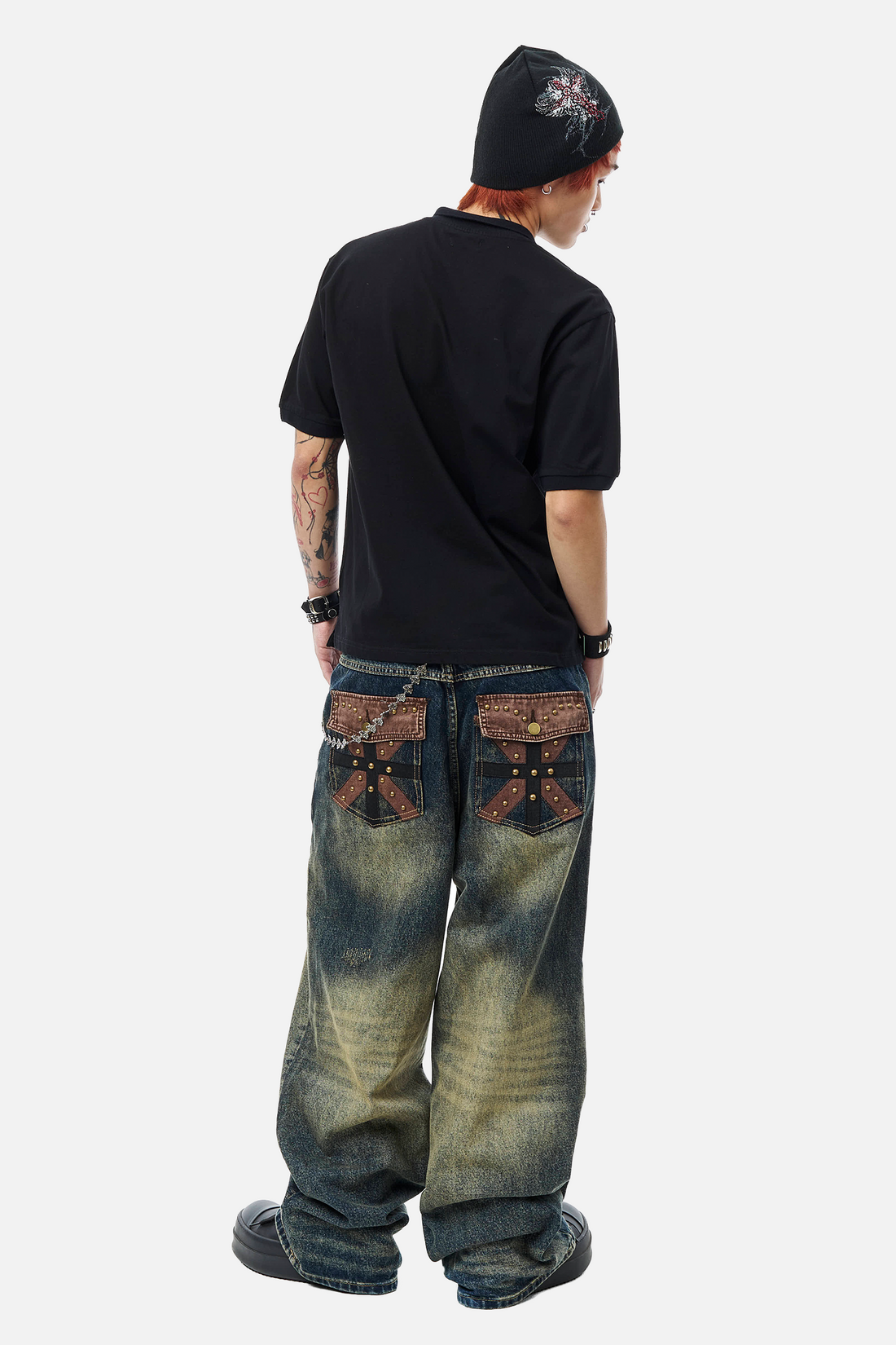 Model in the Embellished Outlaw Denim and black tee, full-length back view