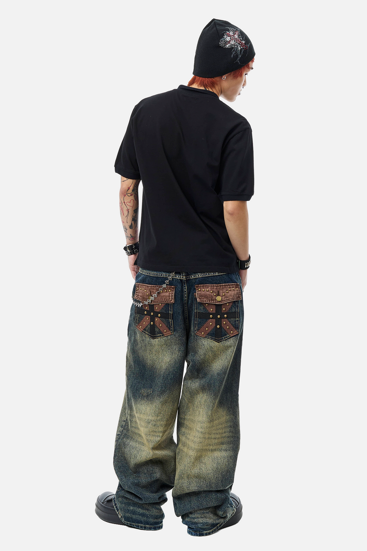 Model in the Embellished Outlaw Denim and black tee, full-length back view
