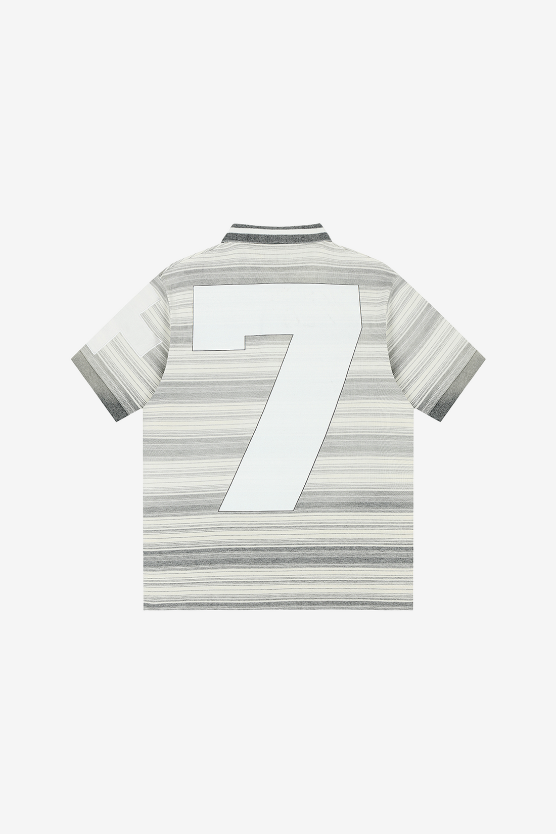 Back of the Striped Crest Polo laid flat, with large white number 7 across the stripes