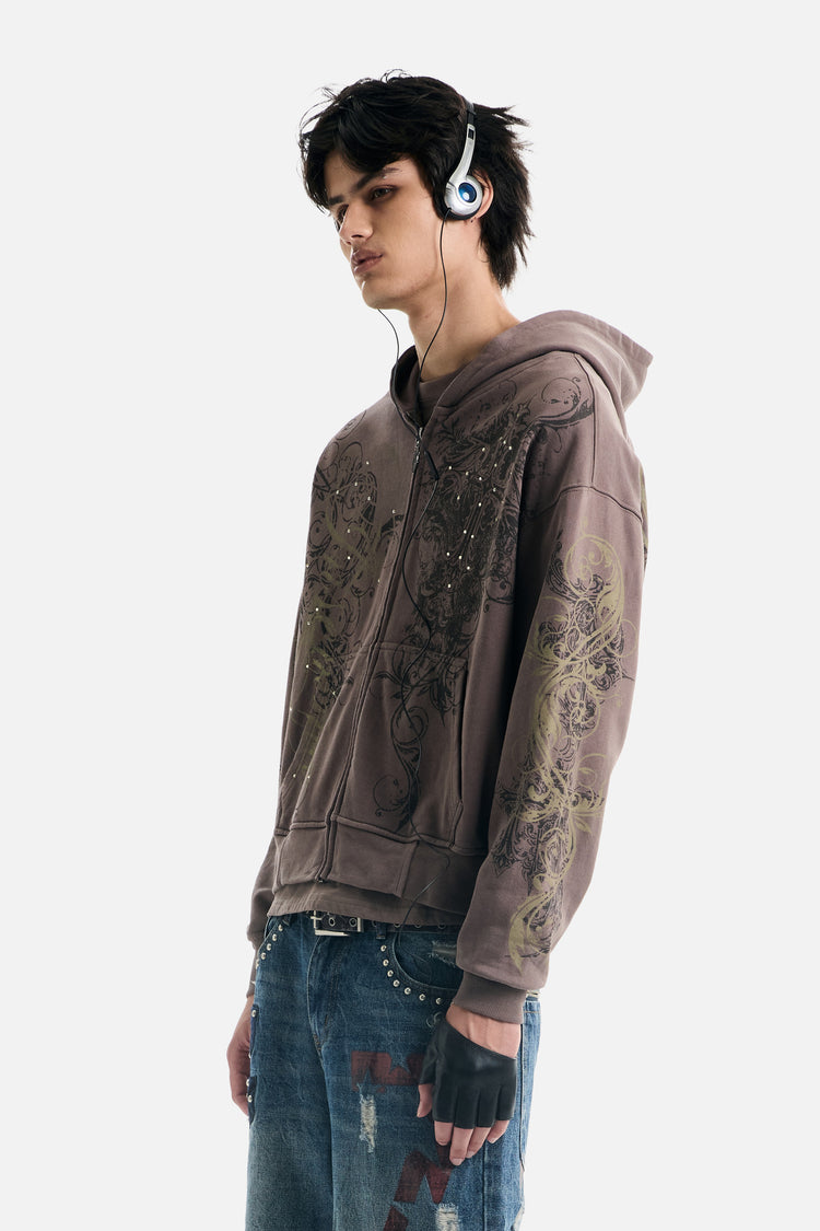 Side angle of the Brown Scripture Eclipse Zip Up Hoodie showing the sleeve scroll print