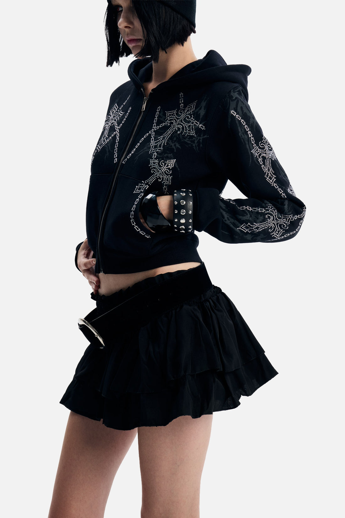 Three-quarter view of the Chain Rhinestone Hoodie with rhinestone chains down the sleeve