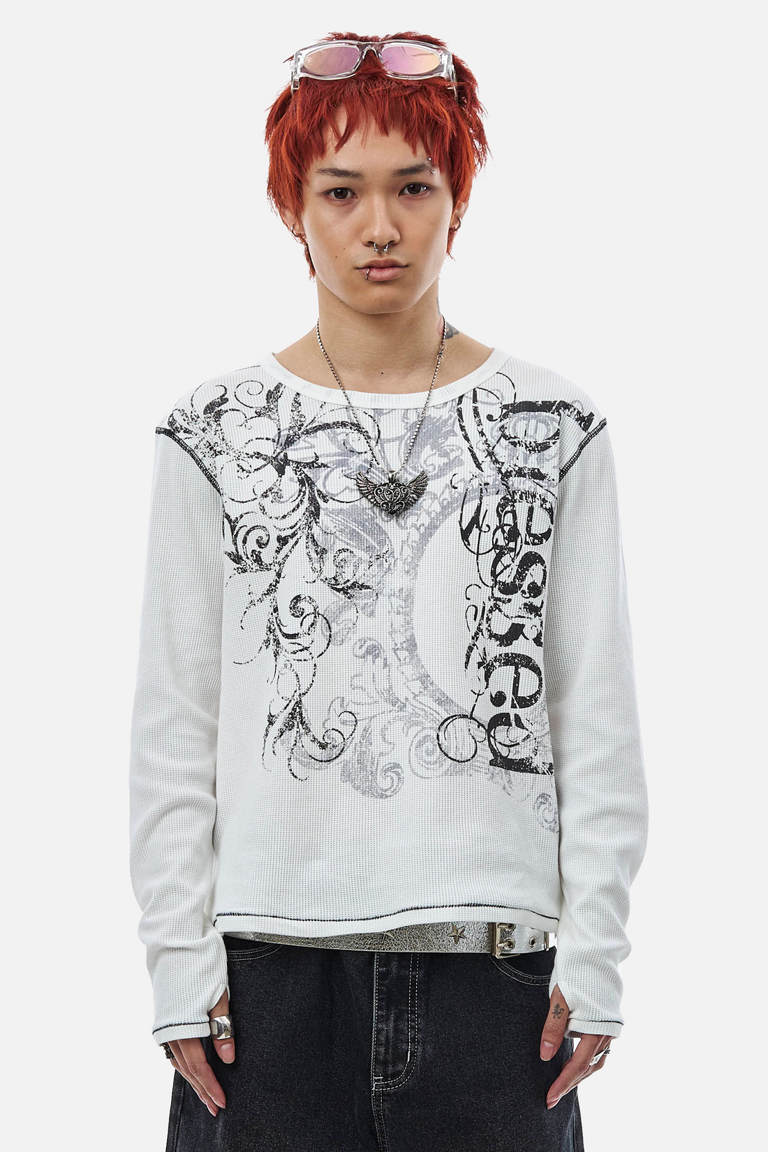 Model in the white Blessed Thermal Long Sleeve with black scroll and Blessed script print