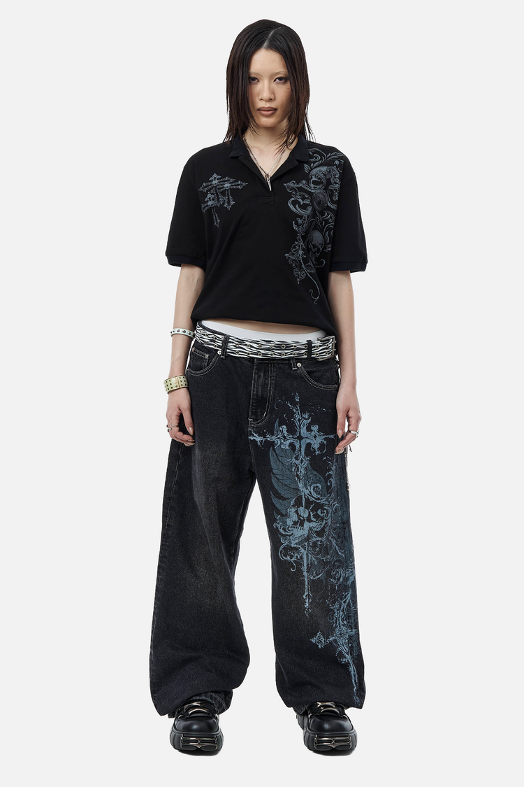 Full-length front view of the Skull Garden Polo with wide black jeans and chunky shoes