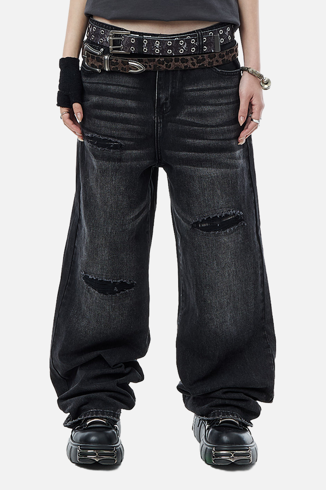 Front view of the washed black Plaid Patch Outlaw Denim with ripped knees and platform shoes