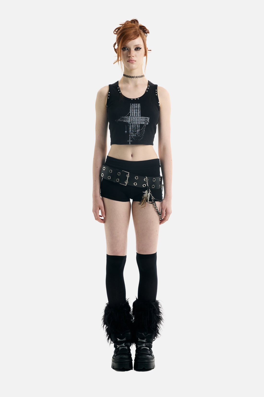 Full-length view of the Gravebound Tank Top styled with grommet belt and platform boots