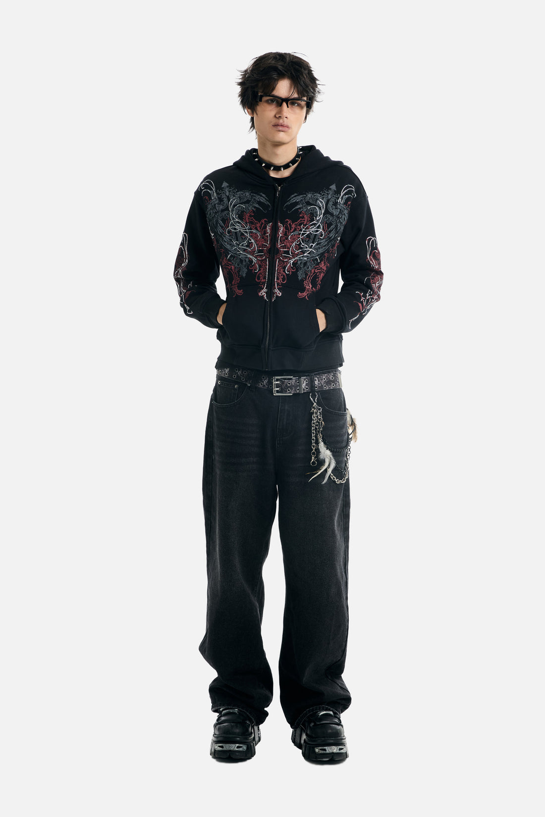 Full-length front view of the zipped Harmony Hoodie and black jeans with wallet chain