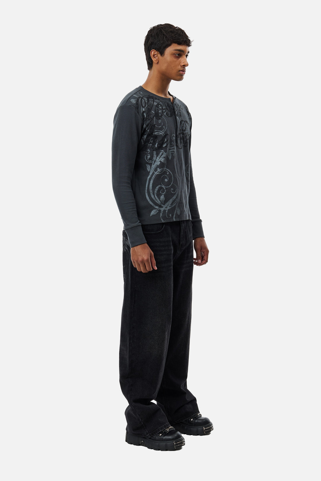 Full-length side view of the Harmony Jeans with a charcoal long-sleeve top