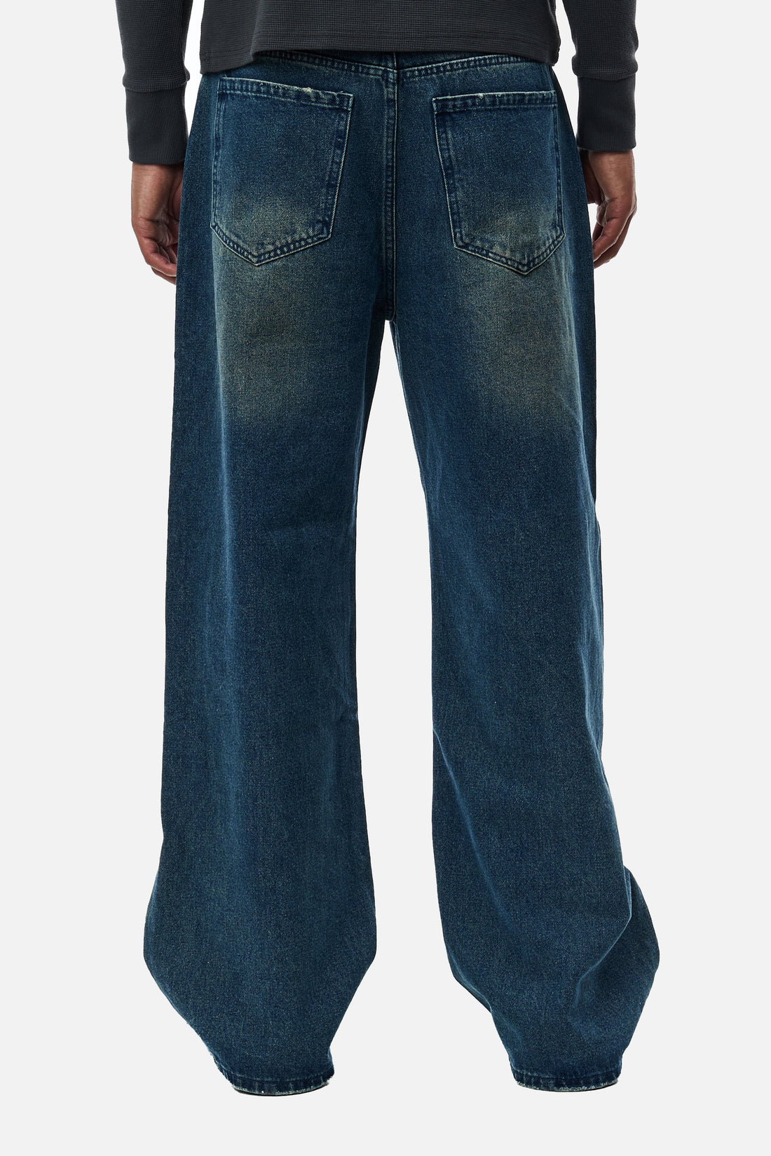 Back view of the Washed Blue Outlaw Denim showing faded whiskering on the seat