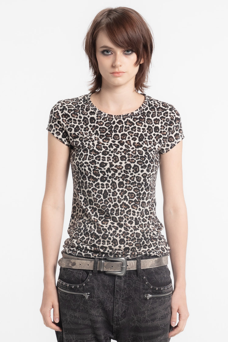 Model in the Cheetah Slim Tee with studded belt and dark jeans, front view