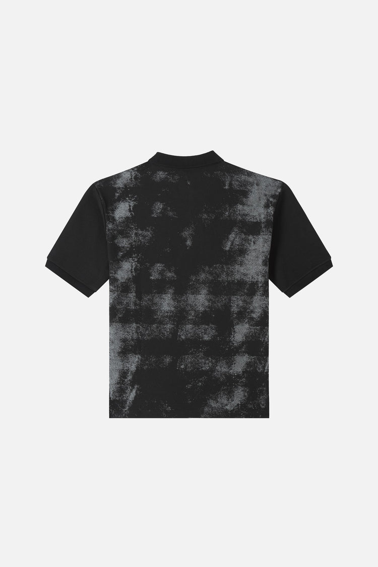 Back of the Midnight Polo laid flat, with faded grey distressed wash