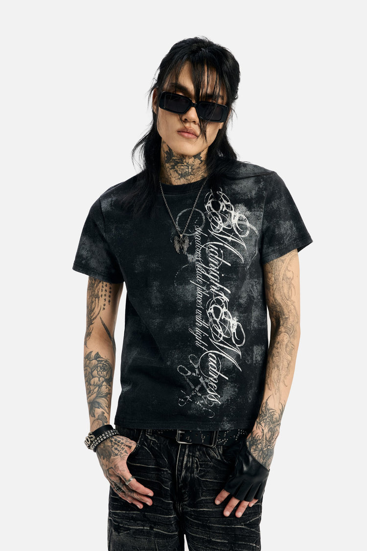 Model in sunglasses wearing the Midnight Tee, waist-up front view