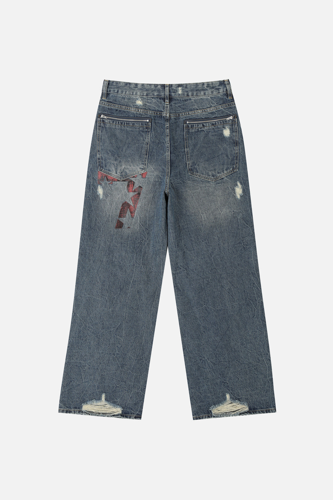 Back of the Patch Outlaw Denim laid flat with red embroidered patch on the back pocket