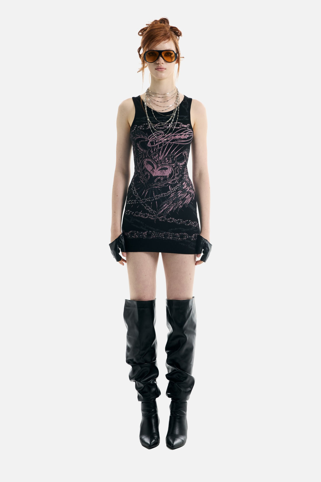 Model in the Rhinestone Chains Dress with black knee-high boots, full-length front view