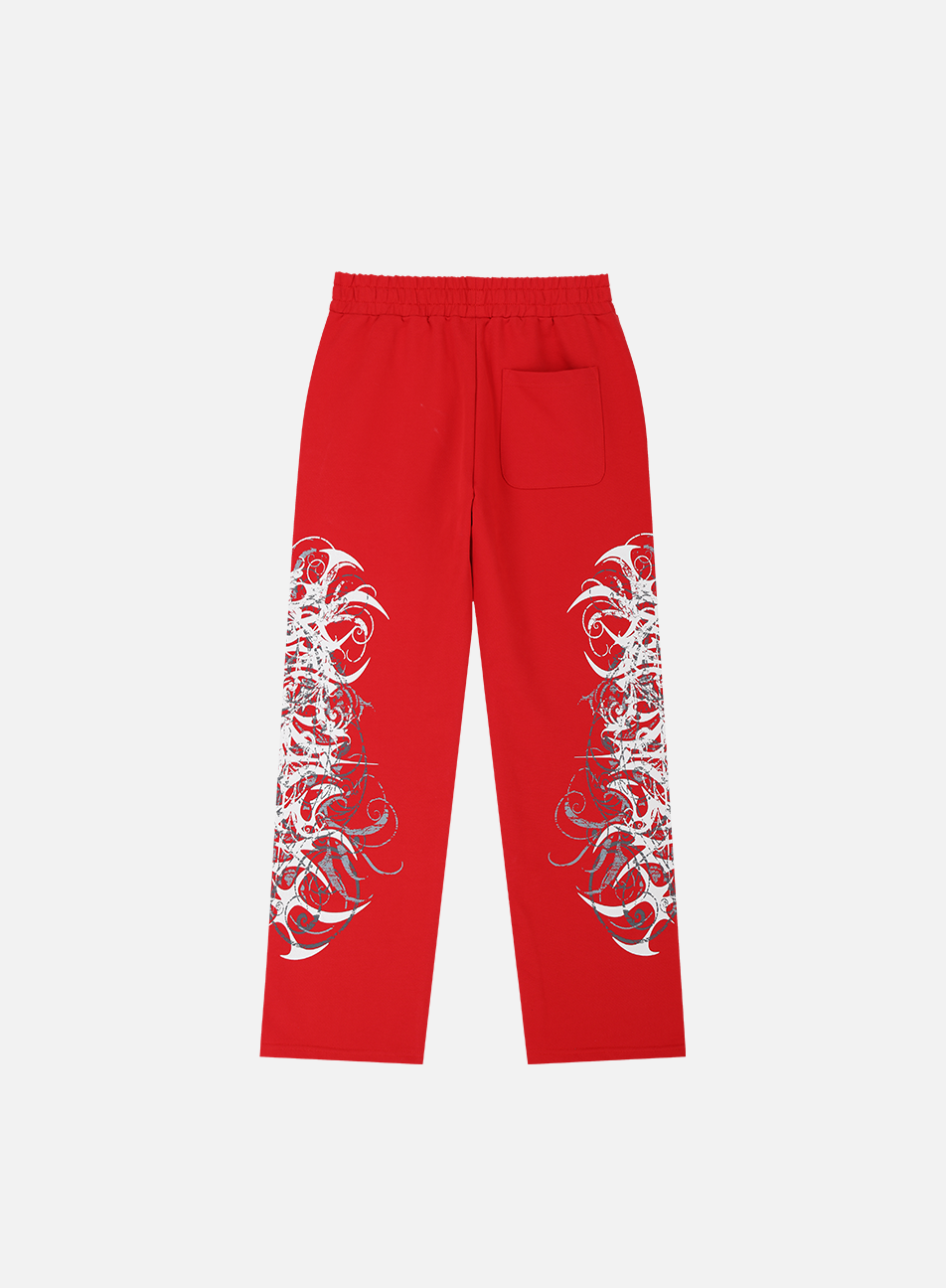 Back of the Red Eclipse Sweatpants laid flat, with back pocket and leg prints