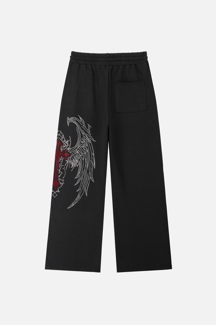 Back of the black Red Cross Baggy Sweats laid flat with red cross and silver wings