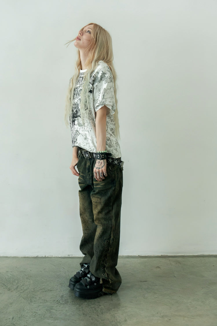 Poem Tee with Shattered Rogue Denim, worn against a white wall