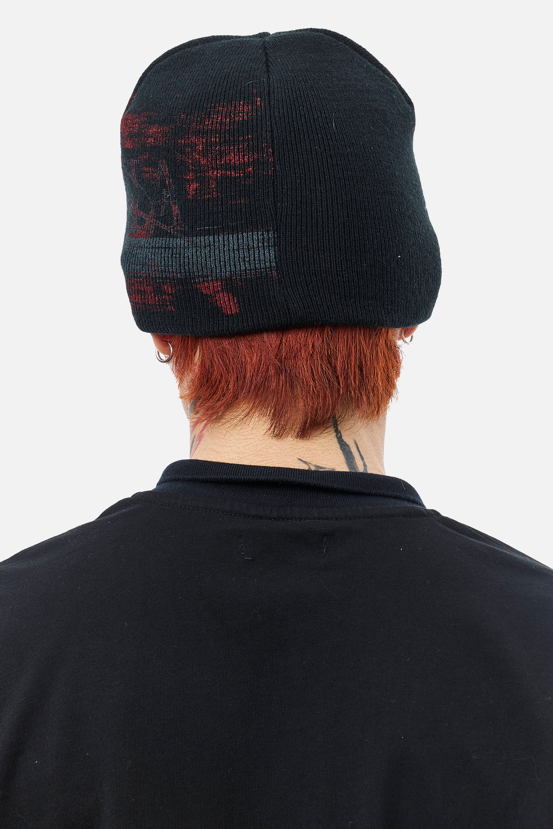 Back view of the Chaos Beanie worn over red hair