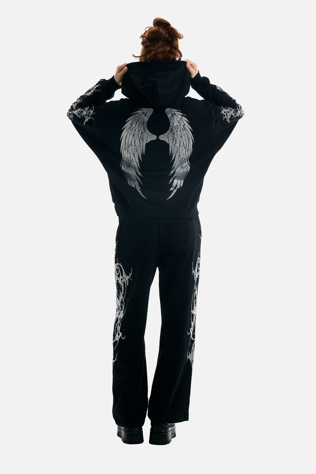 Back view of the Thorns Rhinestone Sweatpants with matching hoodie showing rhinestone wings