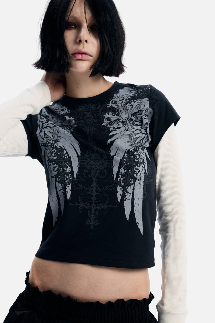 Close-up of the Wings 2fer Womens Long Sleeve wings print with hand at the neck