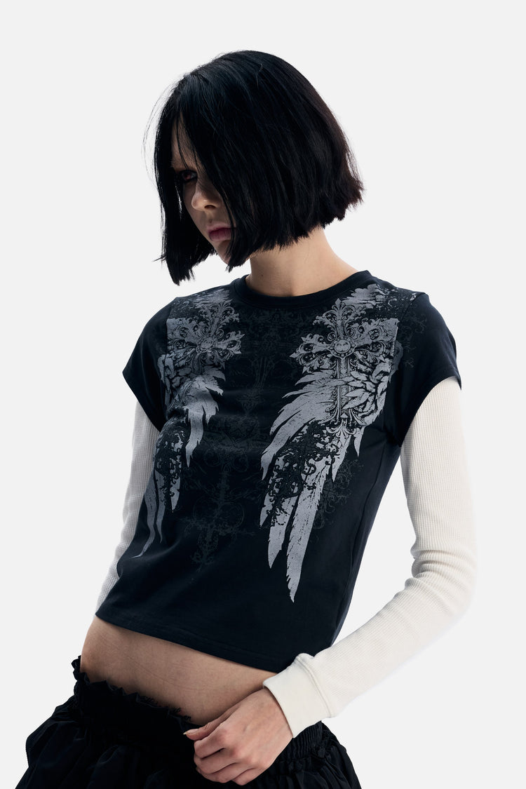Model looking down in the Wings 2fer Womens Long Sleeve, close front view